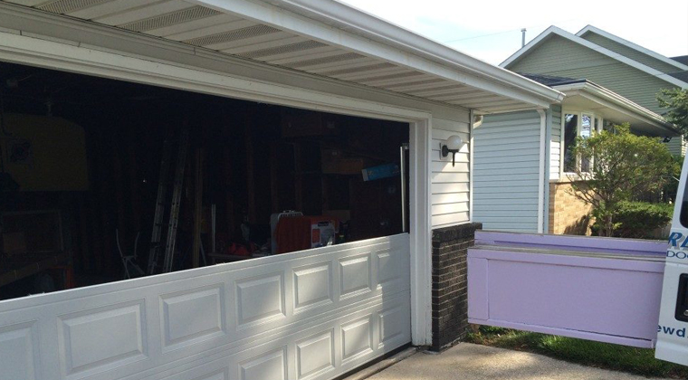 how to replace garage door panels